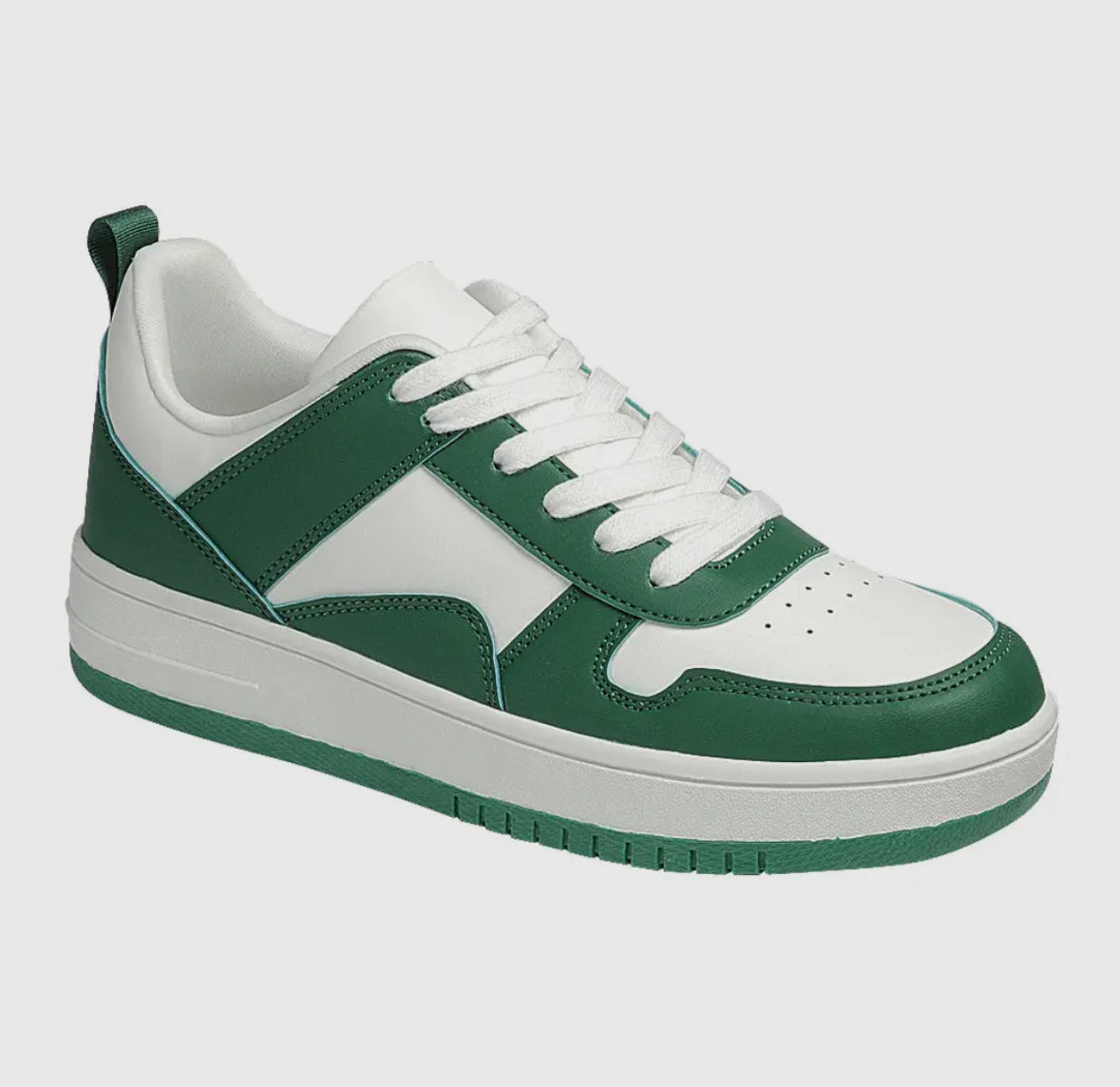 Green and white tennis shoes