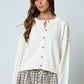 RAW EDGE EXPOSED SEAM BUTTON DOWN KNIT CARDIGAN