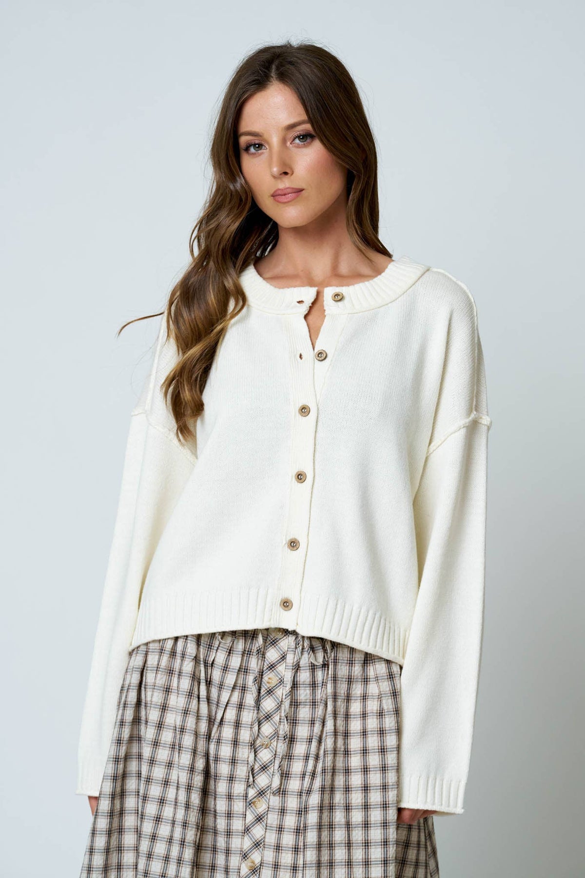 RAW EDGE EXPOSED SEAM BUTTON DOWN KNIT CARDIGAN