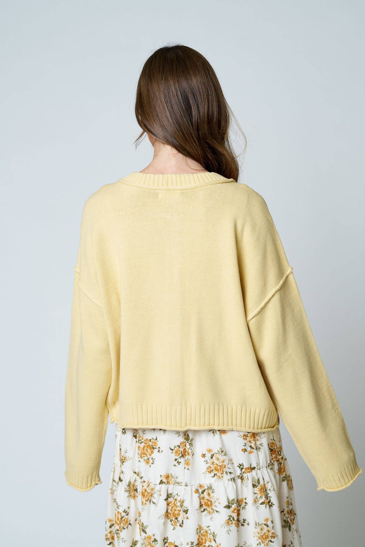 RAW EDGE EXPOSED SEAM BUTTON DOWN KNIT CARDIGAN
