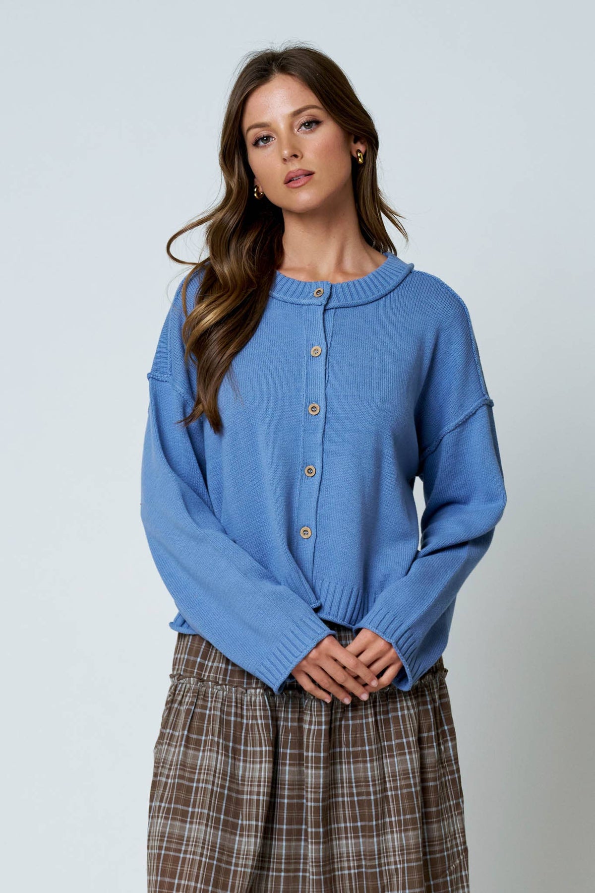 RAW EDGE EXPOSED SEAM BUTTON DOWN KNIT CARDIGAN