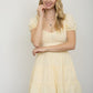MULTI-PATTERN EYELET PUFF
SLEEVE TIERED MIDI DRESS