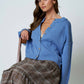 RAW EDGE EXPOSED SEAM BUTTON DOWN KNIT CARDIGAN