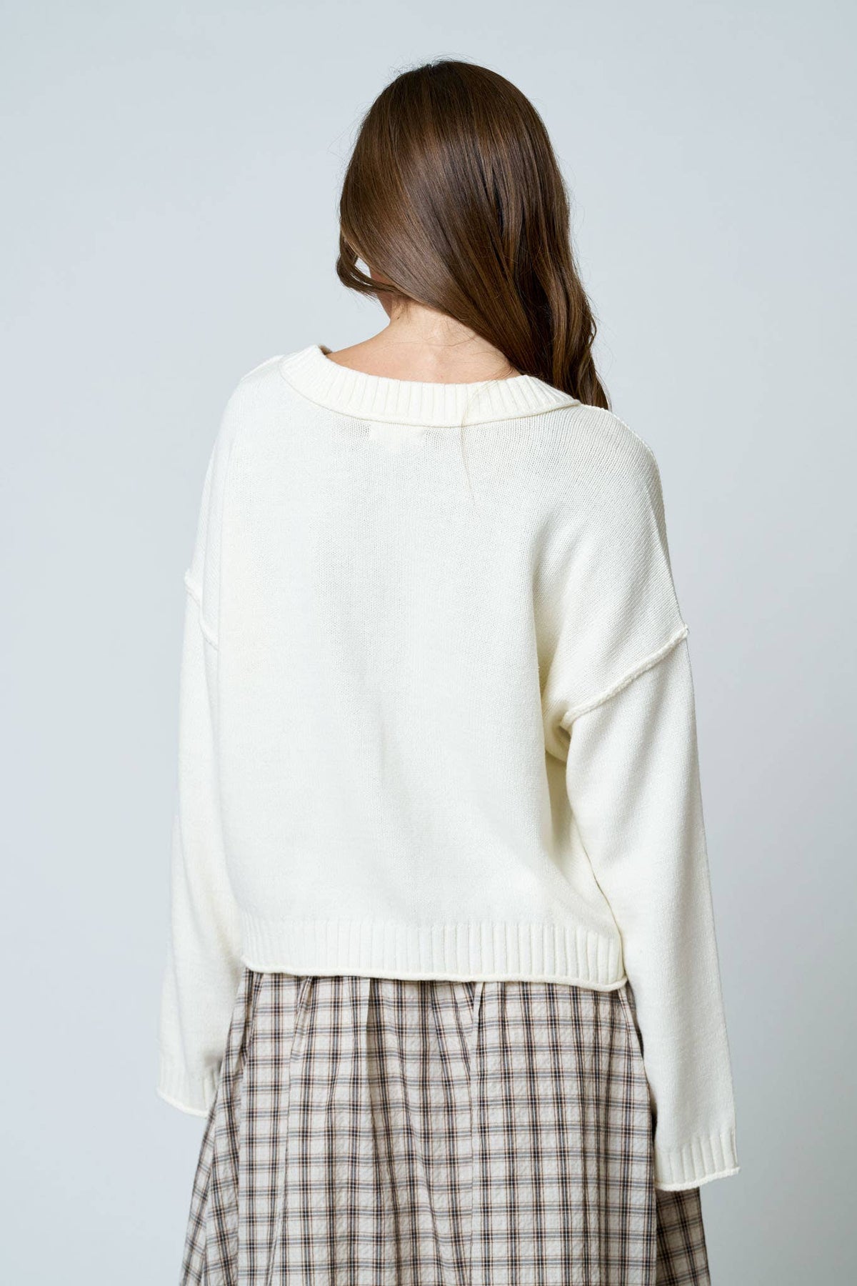 RAW EDGE EXPOSED SEAM BUTTON DOWN KNIT CARDIGAN
