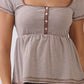 JT57348S - STRIPE SQUARE NK HENLEY BABYDOLL TEE