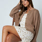 RAW EDGE EXPOSED SEAM BUTTON DOWN KNIT CARDIGAN