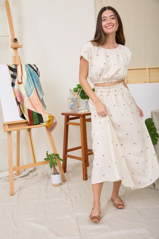 EMBROIDERED FLORAL RUFFLE
WAIST MIDI SKIRT
