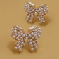 Mini Pearl & Gold Bow Stud Earrings