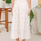 EMBROIDERED FLORAL RUFFLE
WAIST MIDI SKIRT