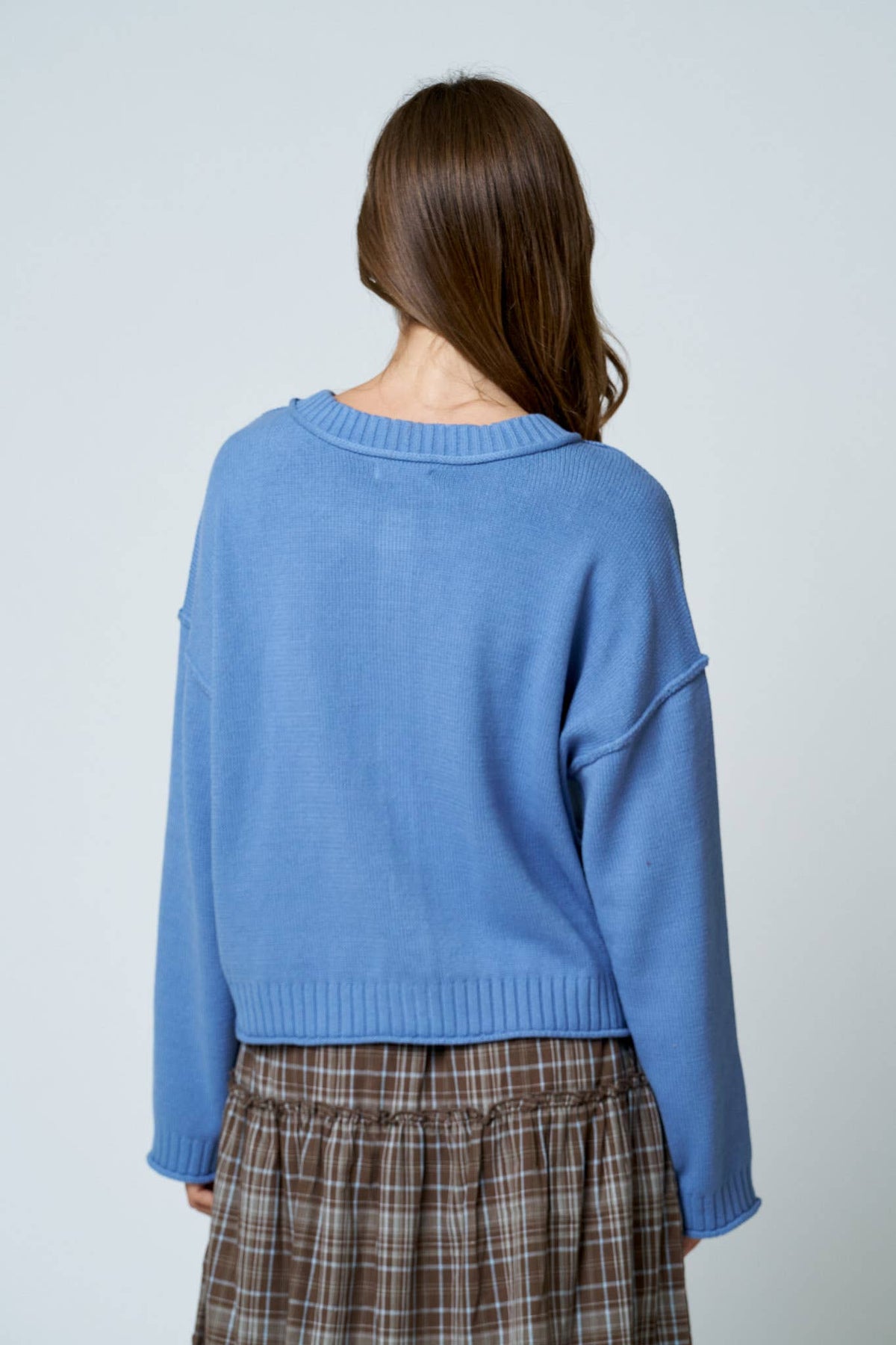 RAW EDGE EXPOSED SEAM BUTTON DOWN KNIT CARDIGAN