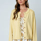 RAW EDGE EXPOSED SEAM BUTTON DOWN KNIT CARDIGAN
