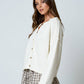 RAW EDGE EXPOSED SEAM BUTTON DOWN KNIT CARDIGAN