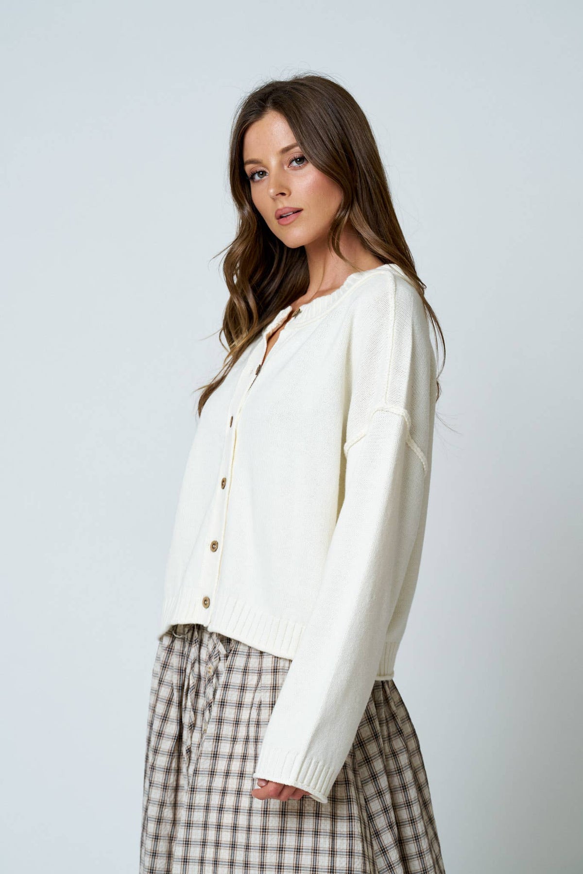 RAW EDGE EXPOSED SEAM BUTTON DOWN KNIT CARDIGAN
